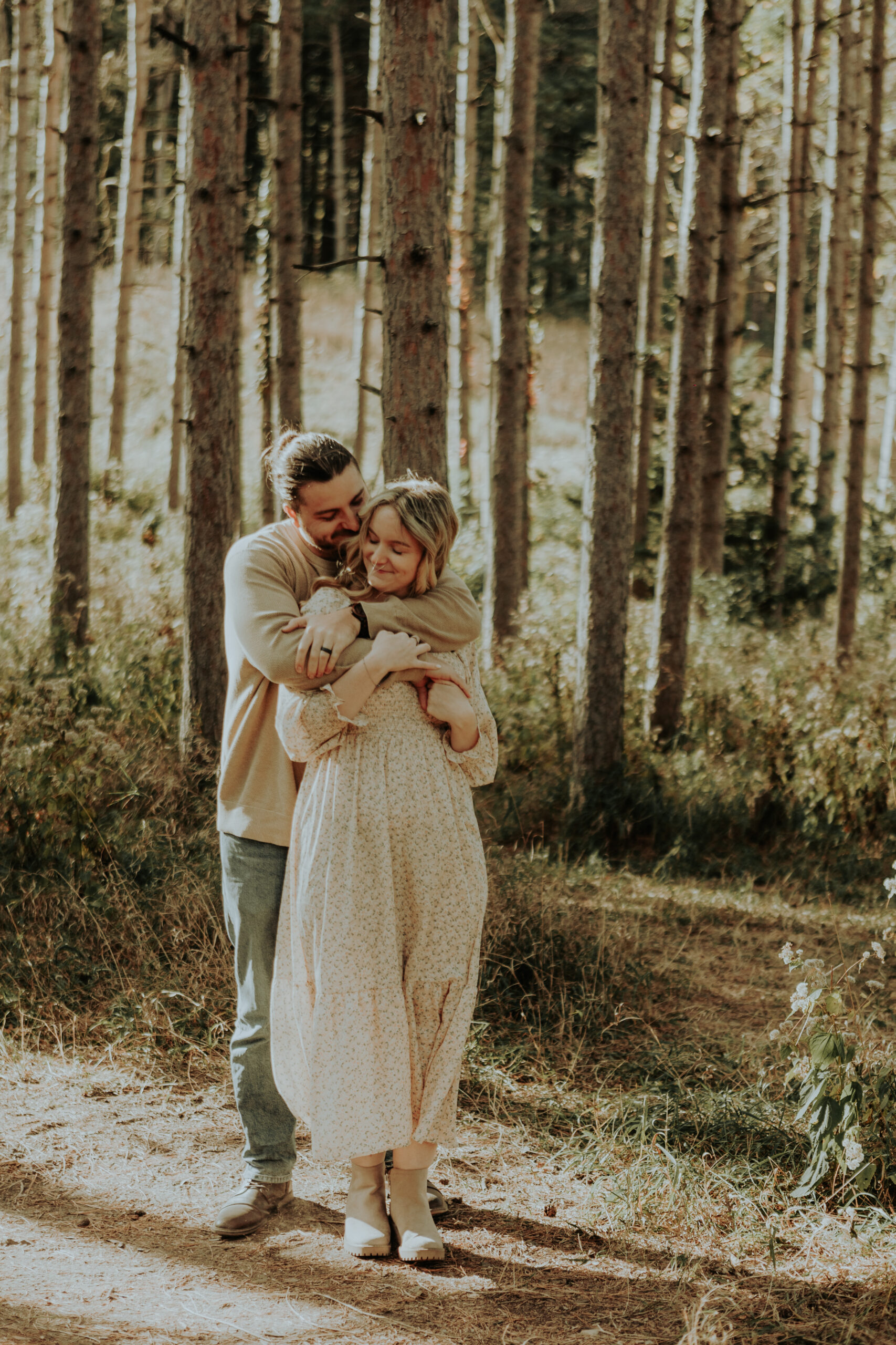 warm, golden-hour couples session at Veterans Acres featuring Emily & Tyler, who are celebrating their growing family